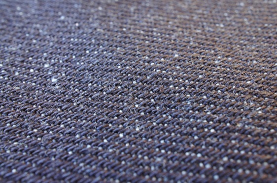 Macro shot of the 16 oz. raw denim fabric.